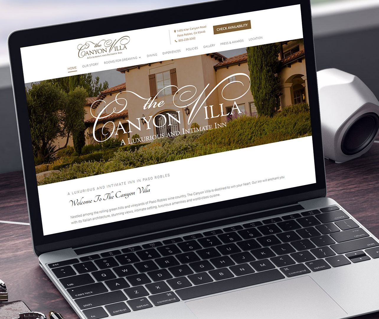 Canyon villa homepage on a laptop screen
